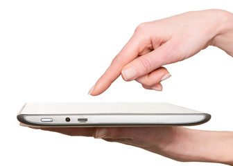 Finger pointing at a tablet computer screen, cut out