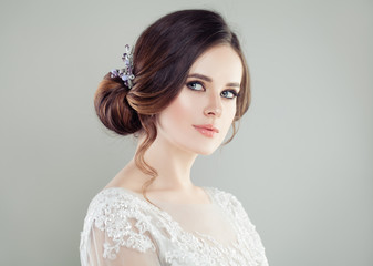 Cute bride with makeup and bridal hairstyle, face closeup