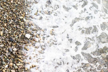 Beach stone background with sea
