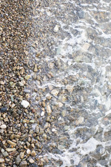 Beach stone background with sea