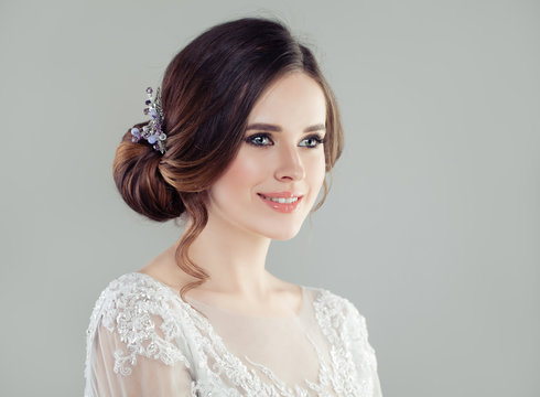 Cheerful Woman With Bridal Updo Hair, Portrait