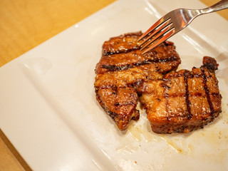 Pork grilled steak on plate