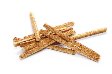Cracker pretzel bread sticks with sesame isolated on white background