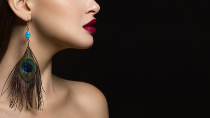 A close-up portrait of the beauty of a ryunette woman with gorgeous face features, which emphasizes...