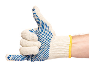 Worker showing action gesture. Male hand wearing working cotton glove with blue rubber dots, isolated on white background.
