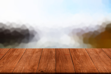 Abstract drawing - background is partially blurred over old light wooden table or board. Collage....