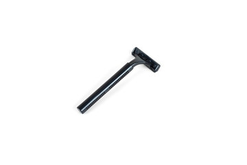 New disposable razor blade, on white background, isolated.