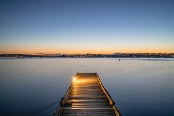 clear evening sunset with dock on lack