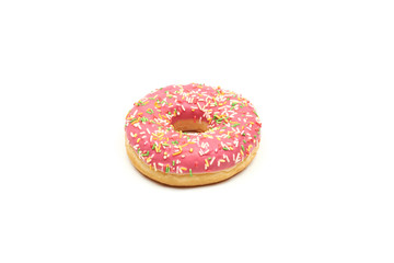 Pink donut with colorful sprinkles isolated on white background.