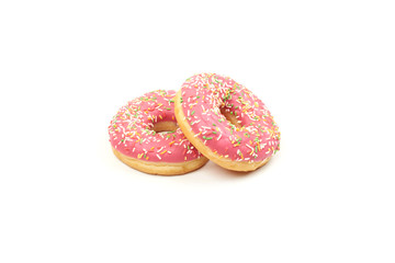 Pink donut with colorful sprinkles isolated on white background.