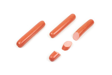 Fresh boiled sausages and slices, isolated on white background