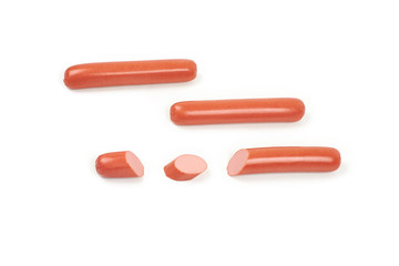 Fresh boiled sausages and slices, isolated on white background