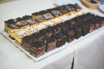 Plate with mini cake desserts © Александра Вишнева