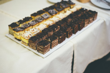 Plate with mini cake desserts