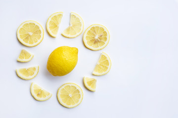Fresh lemon with slices on  white background.