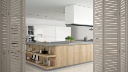 White folding door opening on professional modern wooden kitchen with accessories, interior design, architect designer concept, blur background