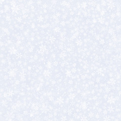 Snowflakes falling on silver grey background