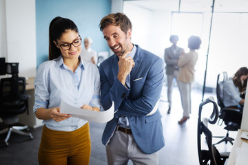 Successful group of business people at work in office