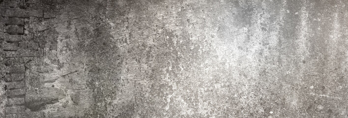 graue alte Betonwand Textur als Hintergrund in XXXL, auf die etwas Licht fällt