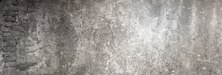 Fototapeta premium graue alte Betonwand Textur als Hintergrund in XXXL, auf die etwas Licht fällt