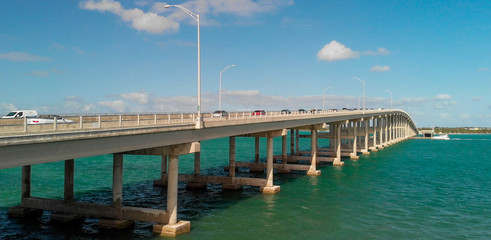 Naklejka premium Aerial view of traffic along Rickenbacker Causeway, Miami - Florida