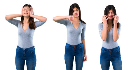 Set of Teenager girl showing thumb down sign with negative expression