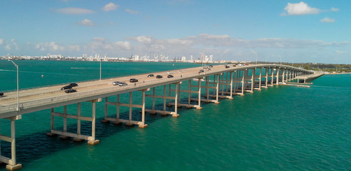 Obraz na płótnie Canvas Aerial view of traffic along Rickenbacker Causeway, Miami - Florida