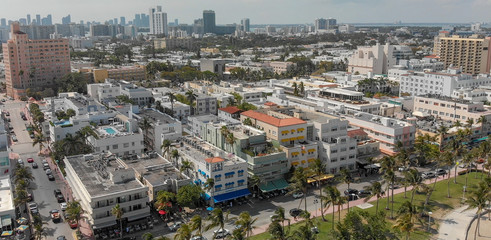 Fototapeta premium Aerial view of Miami Beach skyline and coastline on a sunny day, Florida