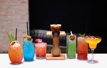 Group of refreshing mixed fruit cocktails with striking colors