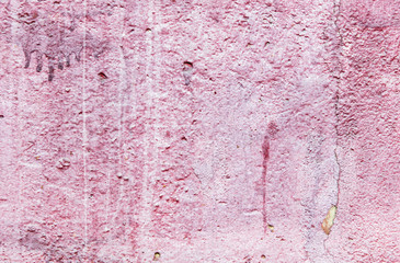 Old wall painted with pink paint as a background