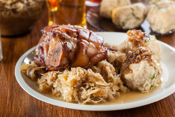 Pork knuckle with fried sauerkraut