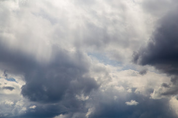Clouds after rain before sunset as a background