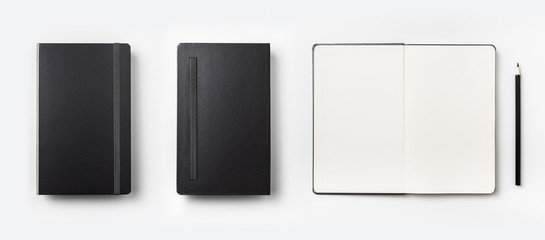 Top view of black notebook isolated on background