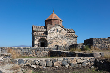 Scenic view of an old Sevanavank church in Sevan, Armenia on sunny  day, blue sky