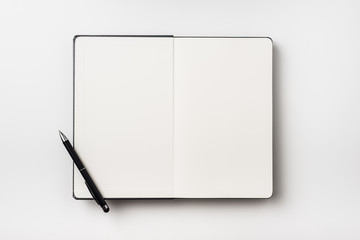 Top view of black notebook isolated on background