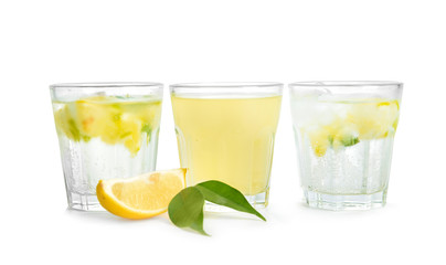 Glasses with cool fresh lemonade on white background