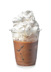 Cold coffee covered with whipped cream in plastic cup on white background