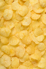 Potato chips texture background top view flat lay