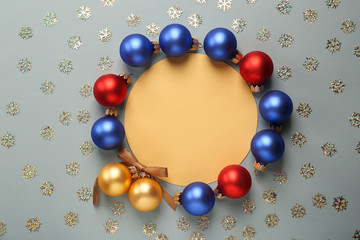 Beautiful Christmas decorations with empty card on grey background