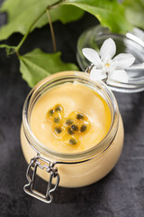 Passion fruit mousse on dark background