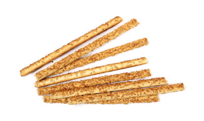 Cracker pretzel bread sticks with sesame isolated on white background, top view