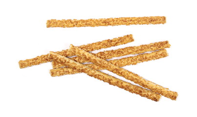 Cracker pretzel bread sticks with sesame isolated on white background, top view