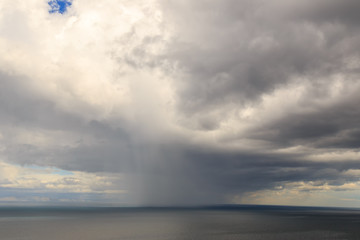 It rains over Lake Baikal. Cloudy weather