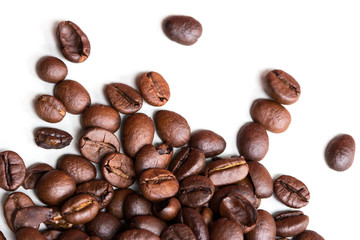 Roasted coffee beans isolated on a white background.