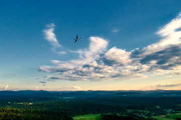 Glider flying over mountains in Bezmiechowa Gorna, Poland. 29-07-2016