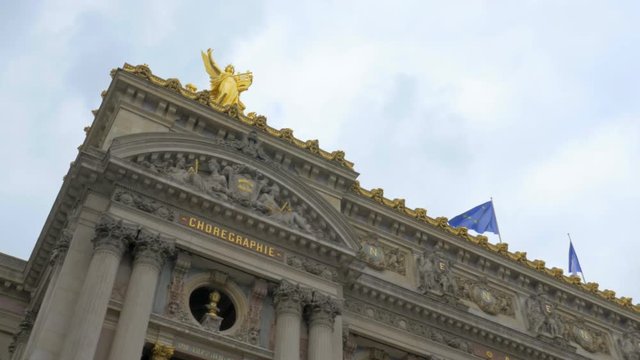 tracking shot of the facade of the Opera in Paris. 