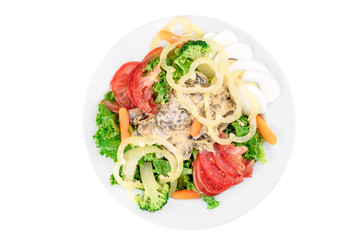 Salad with tomatoes, bell pepper, mushrooms, boiled egg, broccoli and carrots in a white plate isolated on white background. top view. flat lay