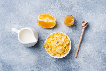 Healthy Breakfast of cereals, milk, honey and fruit. Balanced diet.