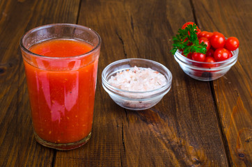 Natural freshly squeezed tomato juice in glass