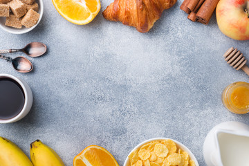 Healthy Breakfast of coffee croissants, milk, honey and fruit. Balanced diet. copy space